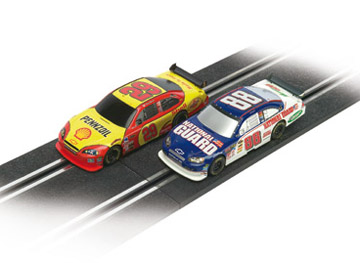 SCX Slot Cars 10021X300 Compact NASCar Slot Car Two Pack.