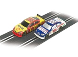 SCX Slot Cars 10021X300 Compact NASCar Slot Car Two Pack.